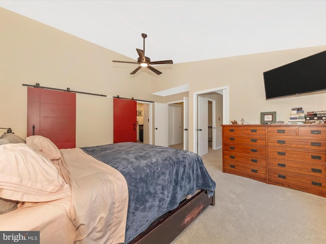 24129 Pecan Grove Ln, Gaithersburg, MD 20882 - bedroom featuring light carpet, a barn door, vaulted ceiling, and a ceiling fan