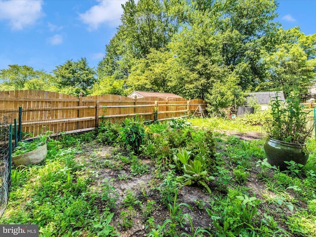 24129 Pecan Grove Ln, Gaithersburg, MD 20882 - fenced backyard with a garden
