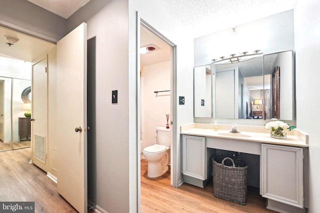 15101 Interlachen Dr Unit 1-126, Silver Spring, MD 20906 - bathroom featuring wood finished floors and vanity
