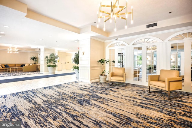 15101 Interlachen Dr Unit 1-126, Silver Spring, MD 20906 - building lobby with a decorative wall, recessed lighting, and wainscoting