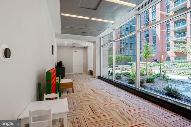 1025 1st St SE Unit 809, Washington, DC 20003 - hallway featuring light colored carpet and a high ceiling