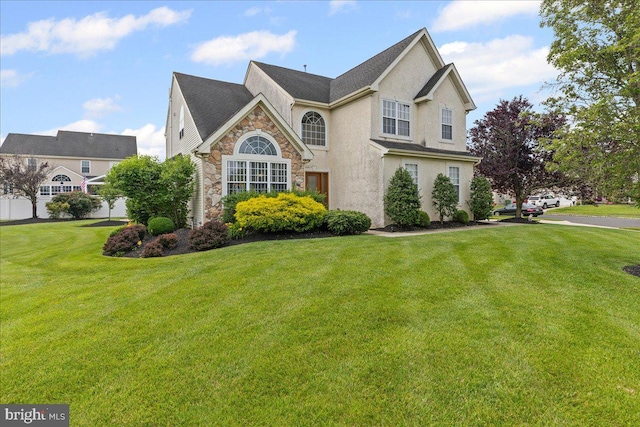 102 Windsor, Swedesboro, NJ 08085 - traditional-style house with a front lawn and stone siding