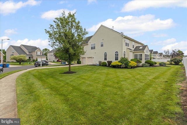 102 Windsor, Swedesboro, NJ 08085 - view of property exterior with an attached garage, concrete driveway, a lawn, and a residential view