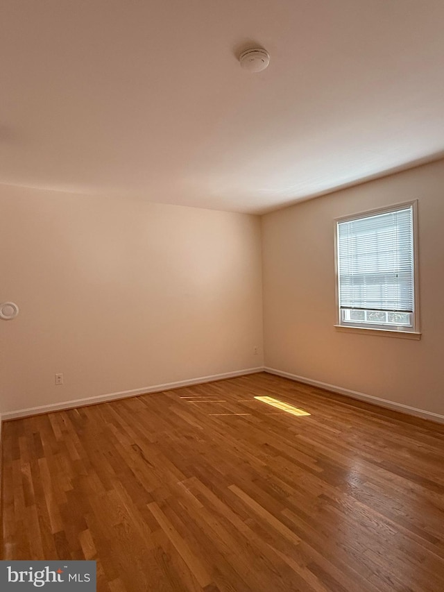 12130 Ambleside Dr, Potomac, MD 20854 - unfurnished room with light wood-style floors and a smoke detector