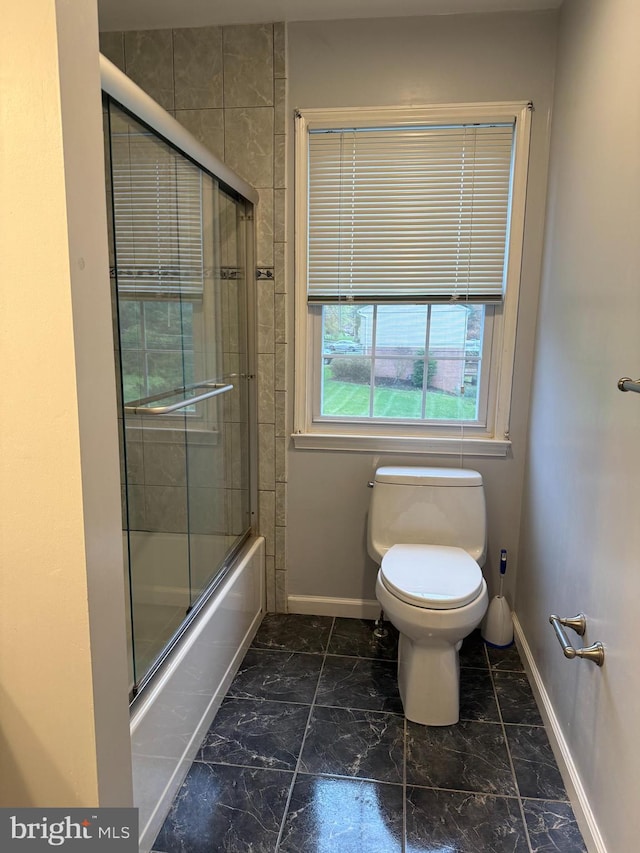 12130 Ambleside Dr, Potomac, MD 20854 - full bath with marble look tiles and enclosed tub / shower combo