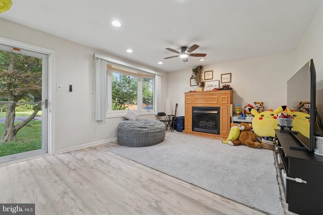 4030 Bensalem Blvd, Bensalem, PA 19020 - living area featuring a fireplace, recessed lighting, wood finished floors, and a ceiling fan