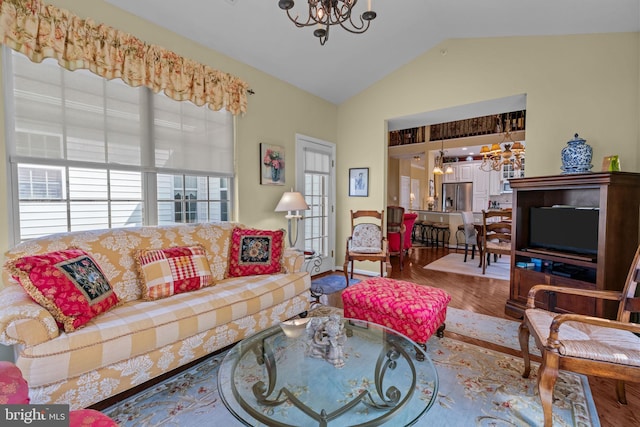 945 Hamilton Way, Warwick, PA 18974 - living area featuring a chandelier, vaulted ceiling, and wood finished floors
