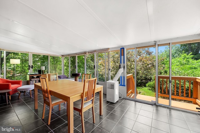 808 Olmstead Rd, Baltimore, MD 21208 - sunroom with tile patterned floors and outdoor dining area