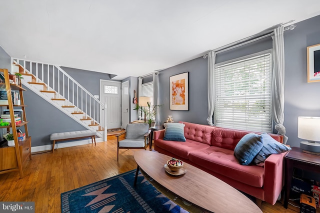 808 Olmstead Rd, Baltimore, MD 21208 - living area featuring stairway and hardwood / wood-style floors