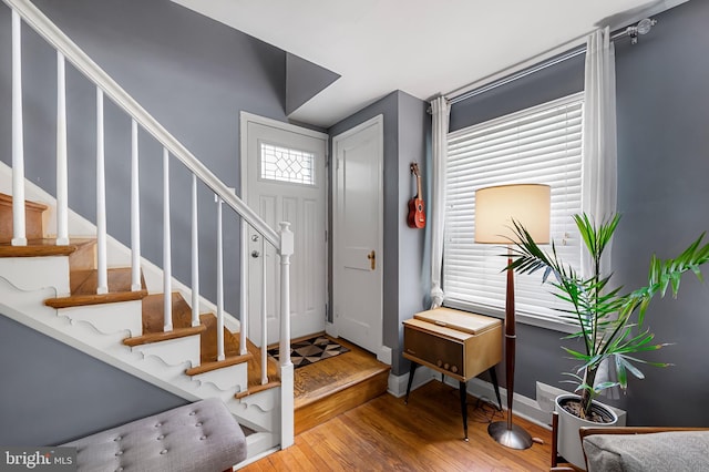 808 Olmstead Rd, Baltimore, MD 21208 - entryway featuring wood finished floors and stairway