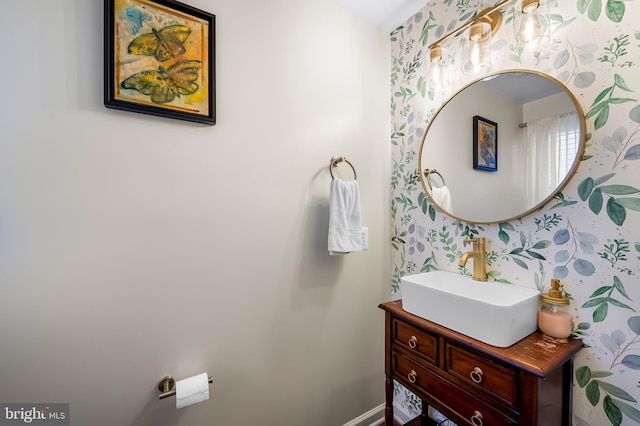 2503 Eastern Ave, Baltimore, MD 21224 - bathroom with wallpapered walls and vanity