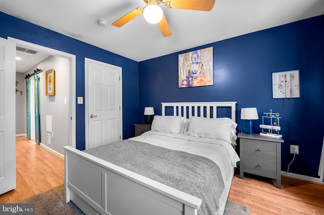 2503 Eastern Ave, Baltimore, MD 21224 - bedroom featuring light wood finished floors and a ceiling fan