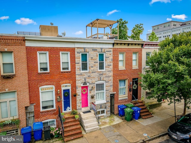 2503 Eastern Ave, Baltimore, MD 21224 - townhome / multi-family property featuring stone siding