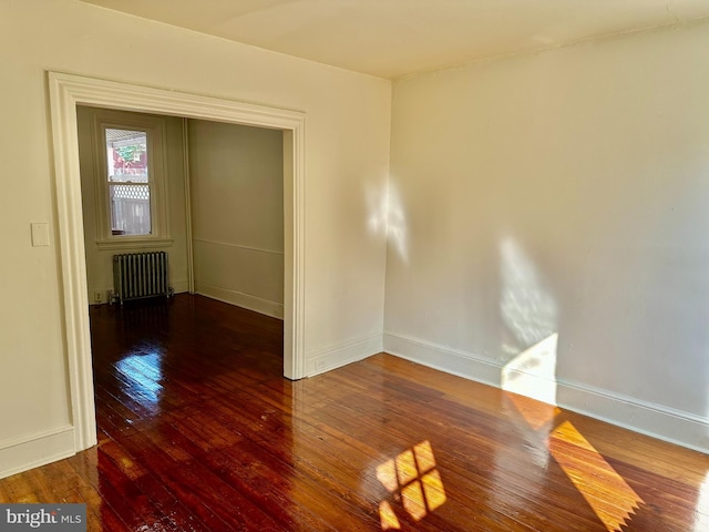 438 S Shippen St, Lancaster, PA 17602 - unfurnished room with radiator heating unit and wood-type flooring