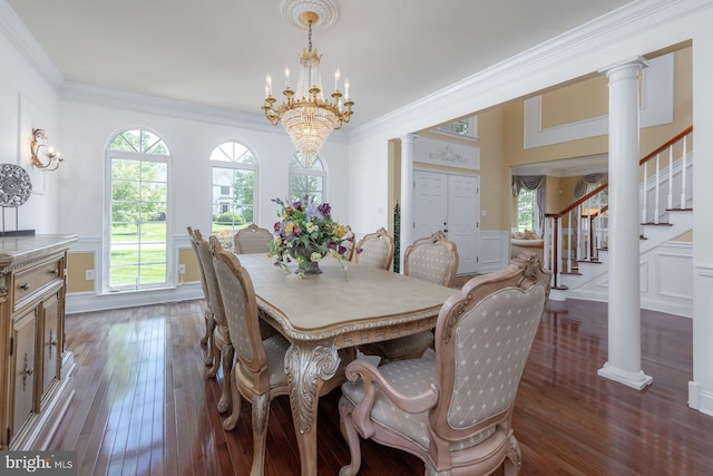 29 Hunters Creek Cir, Mullica Hill, NJ 08062 - dining room featuring a chandelier, hardwood / wood-style flooring, stairs, ornamental molding, and ornate columns