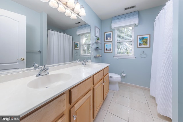 29 Hunters Creek Cir, Mullica Hill, NJ 08062 - full bathroom featuring healthy amount of natural light, double vanity, tile patterned floors, and a shower with shower curtain