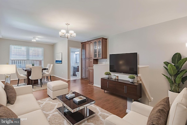 1458 Columbia Rd NW Unit 109, Washington, DC 20009 - living room with a chandelier and wood finished floors