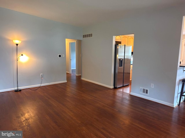 1233 Knightswood Rd, Baltimore, MD 21239 - empty room with dark wood-type flooring