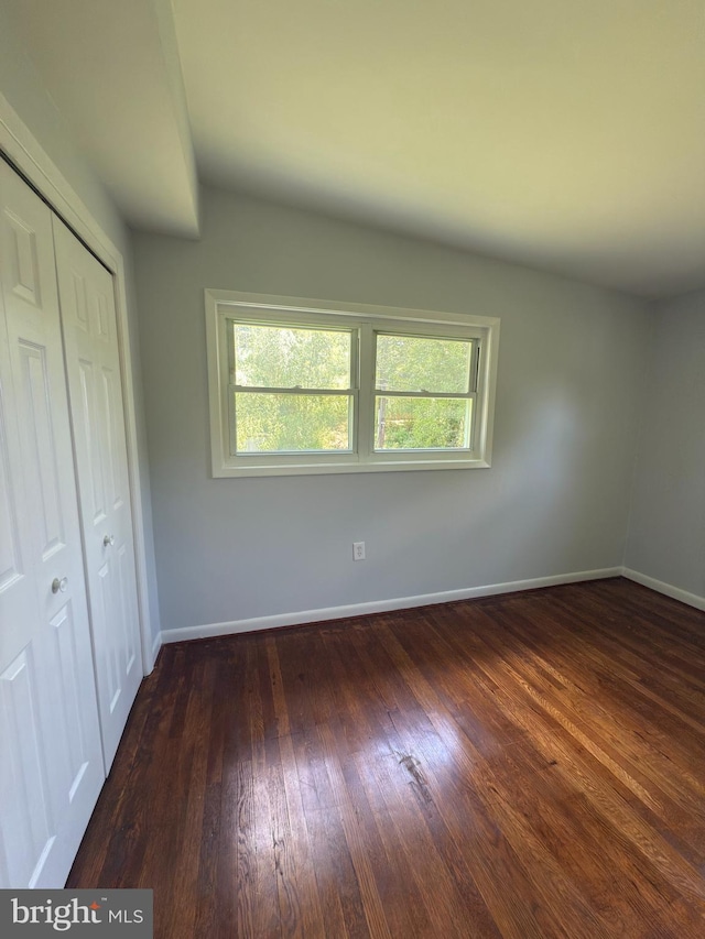 1233 Knightswood Rd, Baltimore, MD 21239 - unfurnished bedroom featuring wood-type flooring and a closet