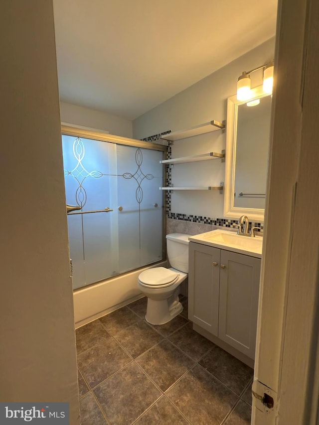 1233 Knightswood Rd, Baltimore, MD 21239 - full bath with vanity, shower / bath combination with glass door, and tile patterned flooring
