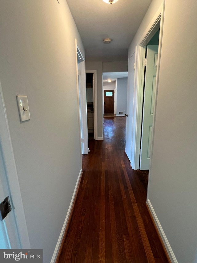 1233 Knightswood Rd, Baltimore, MD 21239 - hall with dark wood finished floors and baseboards