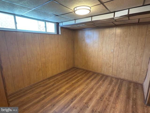 1233 Knightswood Rd, Baltimore, MD 21239 - below grade area featuring wood finished floors and wooden walls
