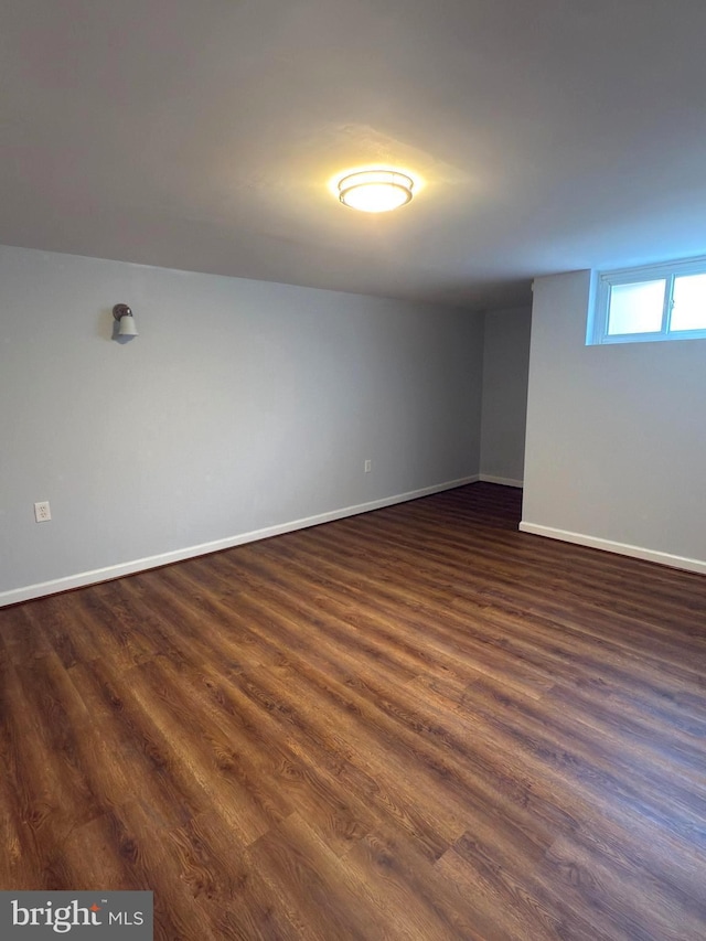 1233 Knightswood Rd, Baltimore, MD 21239 - spare room with dark wood-type flooring and baseboards