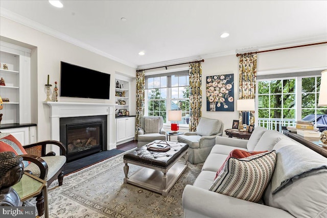 4 Parkview Cir, Wayne, PA 19087 - living area with built in features, crown molding, a fireplace with flush hearth, and recessed lighting