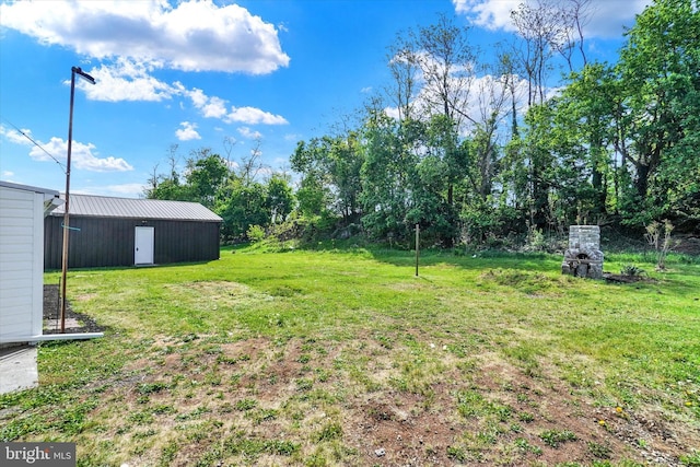 1221 W Heiges St, York, PA 17404 - view of green lawn featuring an outbuilding and an outdoor structure