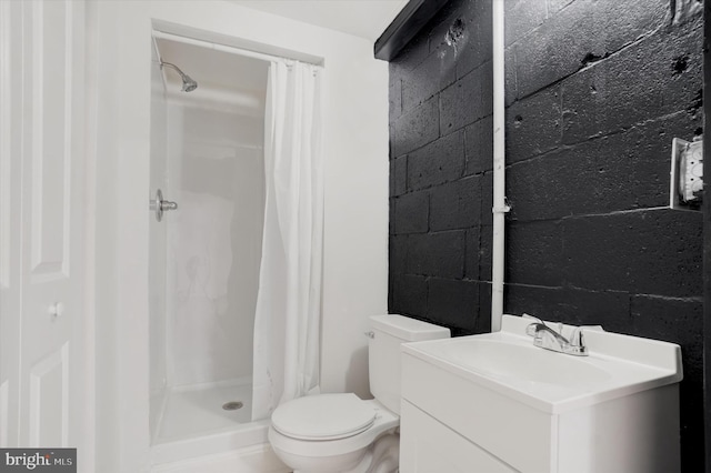 1221 W Heiges St, York, PA 17404 - full bath featuring concrete block wall, a shower stall, and vanity