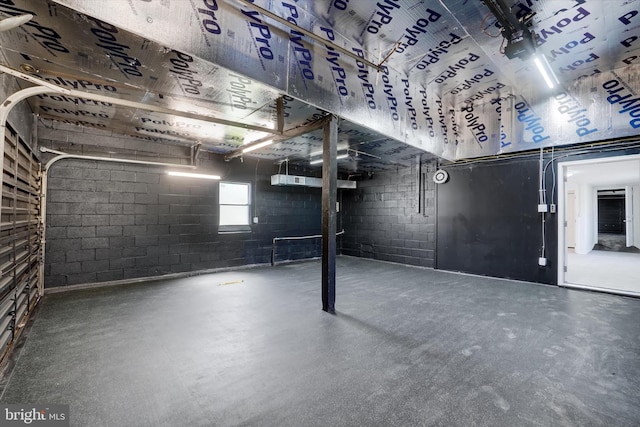 1221 W Heiges St, York, PA 17404 - basement with concrete block wall and a garage