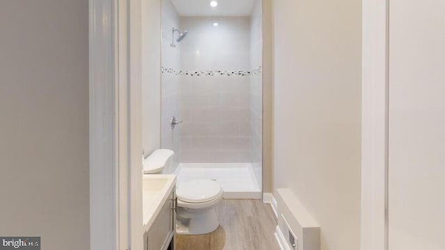 224 N Rose St, Baltimore, MD 21224 - full bathroom with a stall shower, vanity, wood finished floors, and recessed lighting