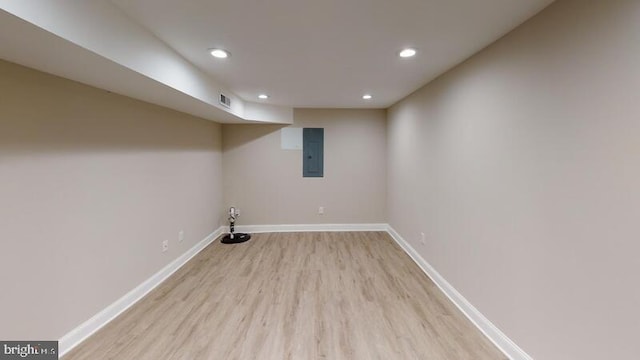 224 N Rose St, Baltimore, MD 21224 - finished basement with electric panel, light wood finished floors, and recessed lighting