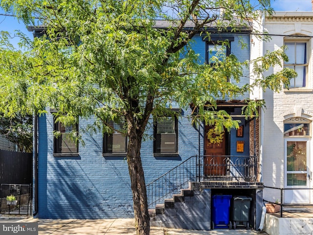 23 W 5th St, Frederick, MD 21701 - view of front facade featuring brick siding