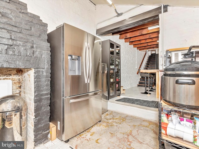 23 W 5th St, Frederick, MD 21701 - below grade area featuring stainless steel fridge and stairway