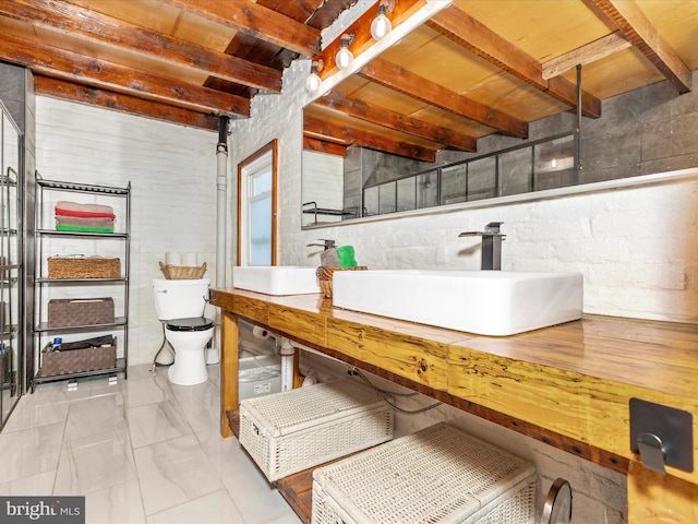 23 W 5th St, Frederick, MD 21701 - below grade area featuring a sink and concrete block wall