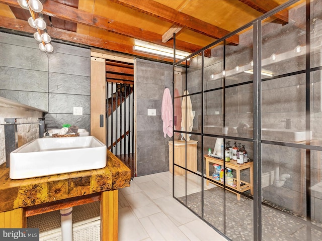 23 W 5th St, Frederick, MD 21701 - bathroom featuring a stall shower and tile walls