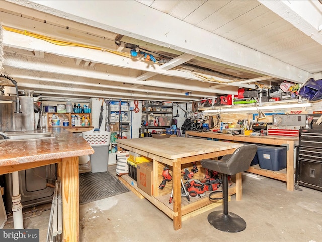 23 W 5th St, Frederick, MD 21701 - garage featuring a workshop area and a sink