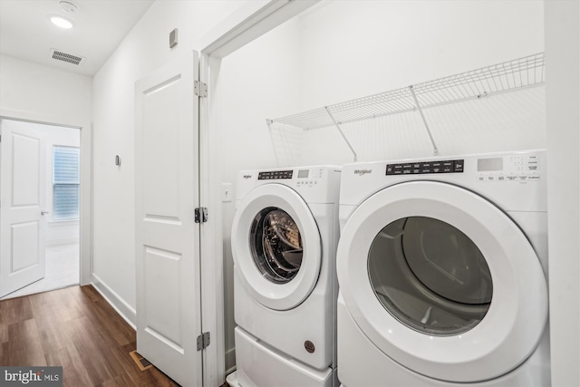 845 King Farm Blvd, Rockville, MD 20850 - laundry area with washing machine and clothes dryer and dark wood-type flooring