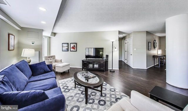 2111 Wisconsin Ave NW Unit 109, Washington, DC 20007 - living room featuring wood finished floors and recessed lighting