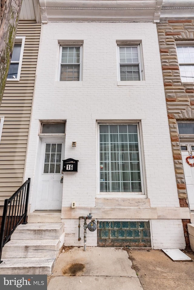 16 S Kresson St, Baltimore, MD 21224 - view of front of property with brick siding