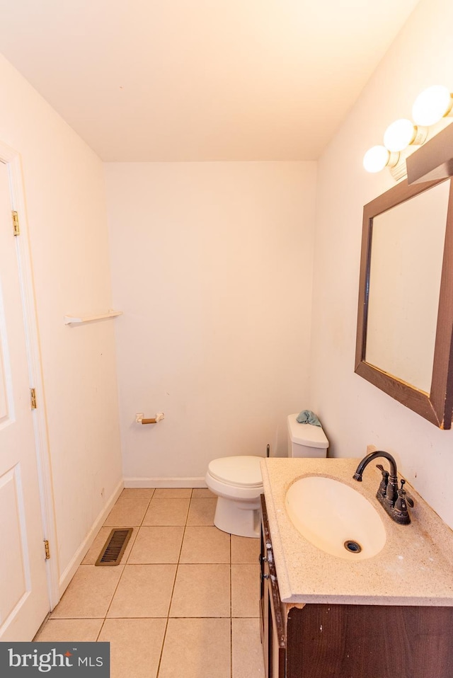 16 S Kresson St, Baltimore, MD 21224 - bathroom featuring vanity and tile patterned flooring