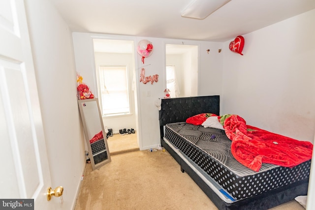 16 S Kresson St, Baltimore, MD 21224 - carpeted bedroom featuring baseboards