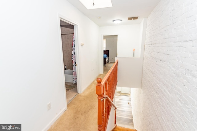 16 S Kresson St, Baltimore, MD 21224 - hall with an upstairs landing and a skylight