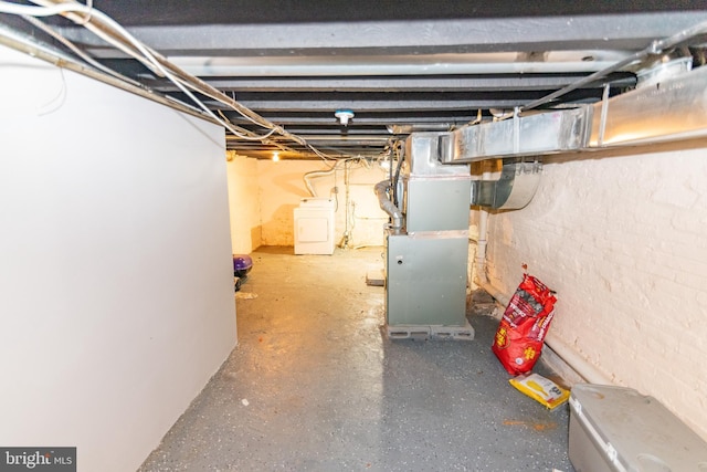 16 S Kresson St, Baltimore, MD 21224 - unfinished below grade area with washer / clothes dryer and heating unit