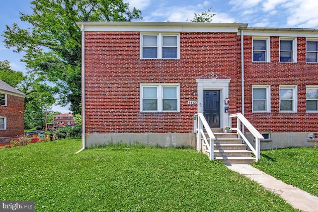 1112 Gleneagle Rd, Baltimore, MD 21239 - view of front of property featuring a front lawn and brick siding