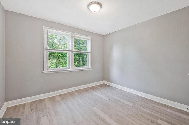 1112 Gleneagle Rd, Baltimore, MD 21239 - empty room featuring wood finished floors