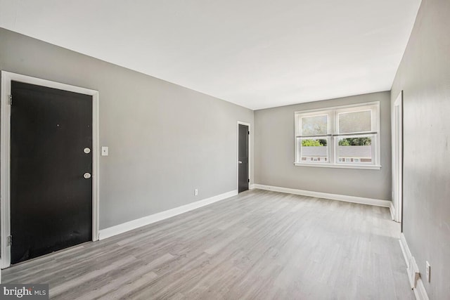 1112 Gleneagle Rd, Baltimore, MD 21239 - unfurnished room with wood finished floors