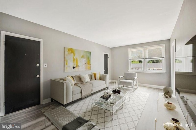 1112 Gleneagle Rd, Baltimore, MD 21239 - living room with wood finished floors