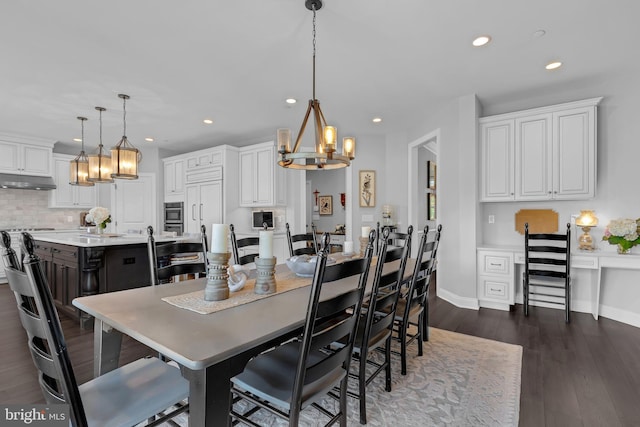 306 Rowland Ln, Line Lexington, PA 18932 - dining space featuring a chandelier, recessed lighting, and dark wood finished floors